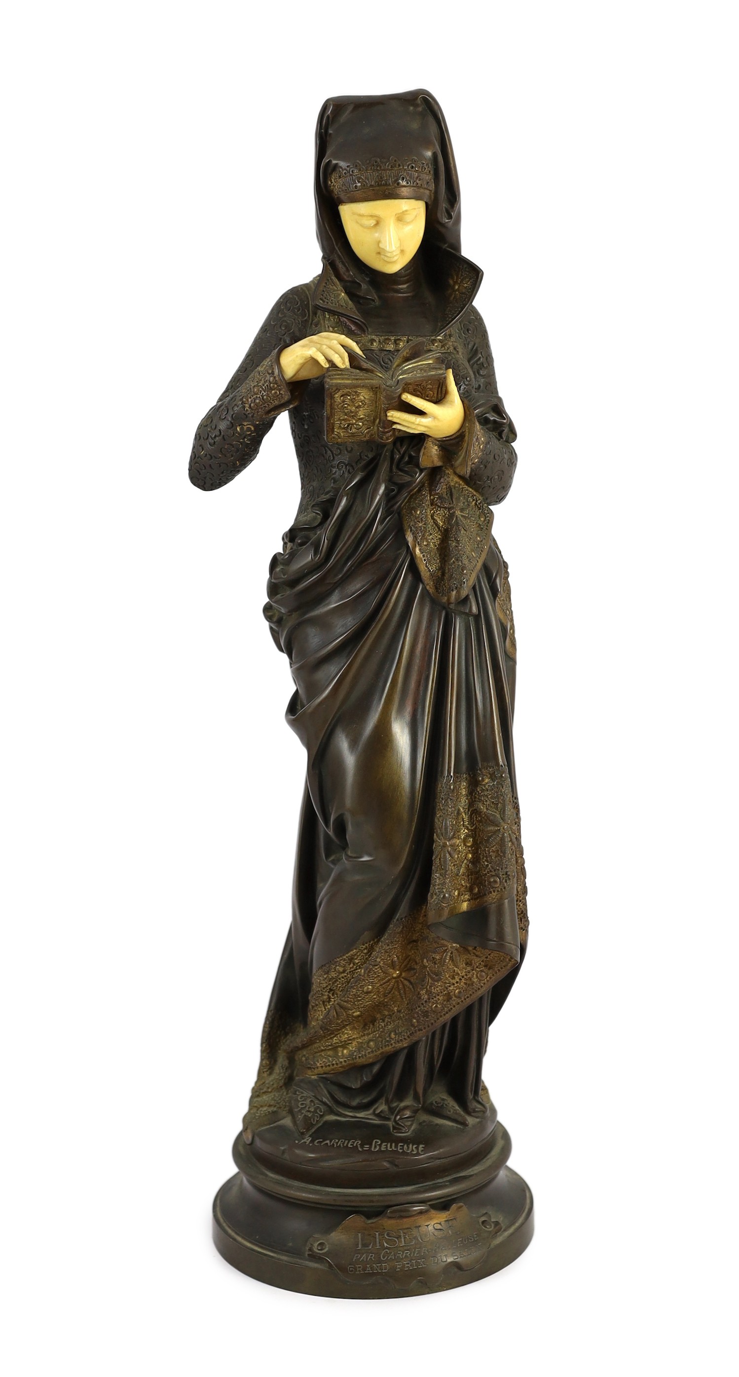 Albert-Ernest Carrier-Belleuse (French, 1824-1887). A parcel gilt bronze and ivory figure, 'Liseuse', height 60cm
